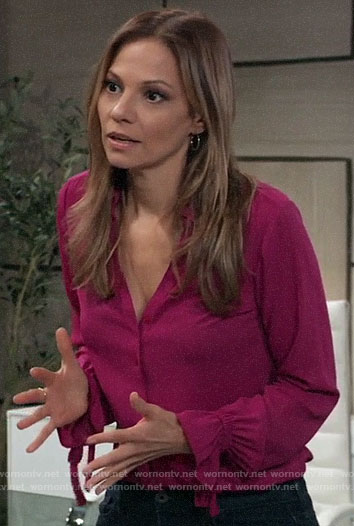 Kim's pink button front blouse with ruffle cuffs on General Hospital