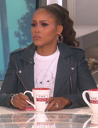 Eve's white Picasso print tee and leather jacket on The Talk