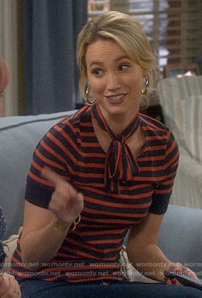 Mandy's red striped tie-neck top on Last Man Standing
