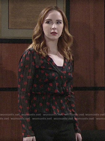 Mariah’s black and red floral blouse on The Young and the Restless