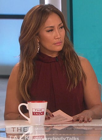 Carrie’s maroon twist neck top on The Talk