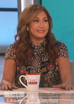 Carrie’s mixed print tie neck blouse on The Talk