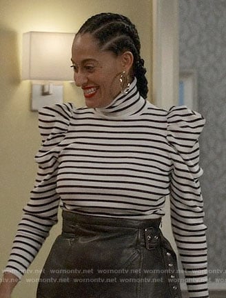 Bo’s striped puff shoulder sweater and leather skirt on Black-ish