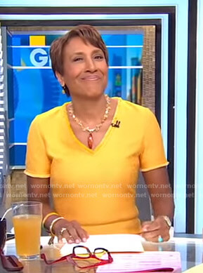 Robin’s orange v-neck knit dress on Good Morning America