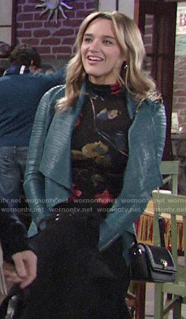 Summer’s black floral turtleneck and teal blue leather jacket on The Young and the Restless