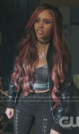 Toni’s plaid crop top and lace-up front jeans on Riverdale
