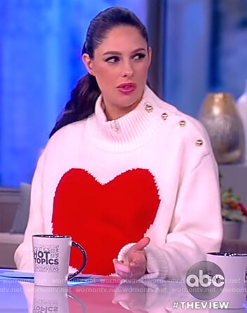 Abby’s white heart sweater with shoulder buttons on The View