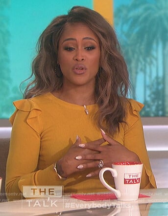 Eve’s yellow ruffle shoulder sweater on The Talk