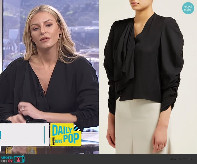 ruched sleeve top by A.W.A.K.E worn by Morgan Stewart on E! News