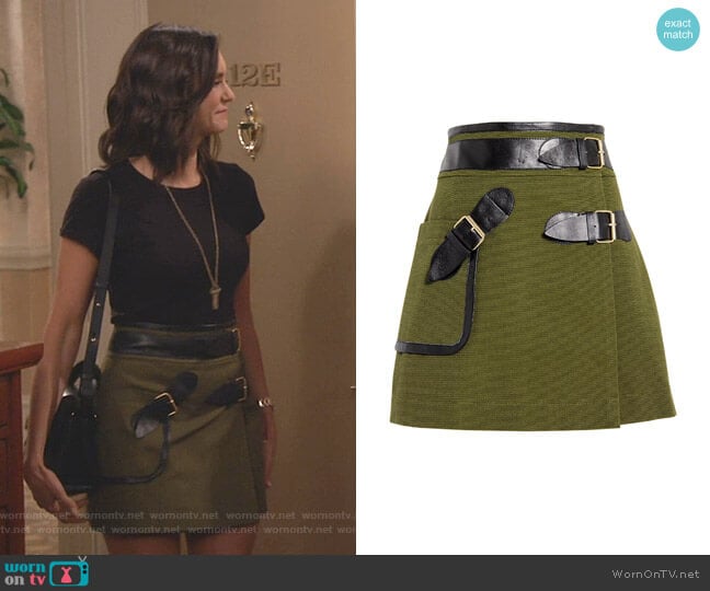 Clem’s green skirt with buckles on Fam