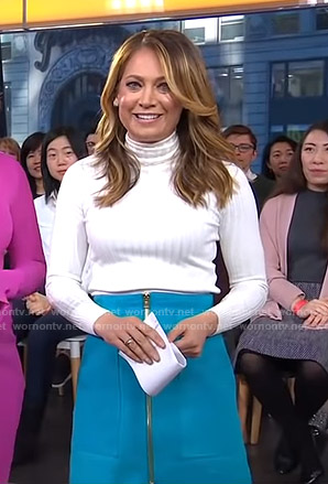 Ginger’s turtleneck sweater and teal suede skirt on Good Morning America