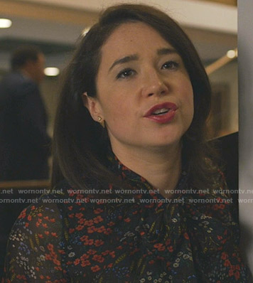 Marissa's black floral tie neck blouse on The Good Fight