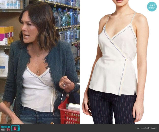 Camille’s white wrap top on Splitting Up Together