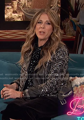 Rita Wilson's black studded moto jacket on Busy Tonight