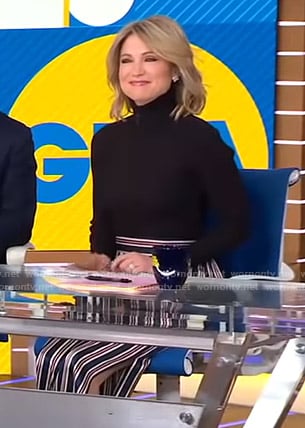 Amy’s black turtleneck sweater and striped slit pants on Good Morning America