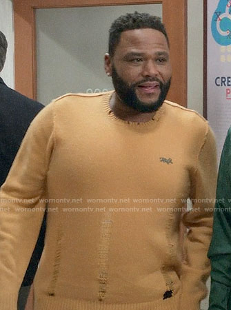 Andre's yellow distessed sweater on Black-ish