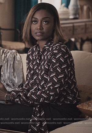 Daisy's black geometric print tie neck blouse on Madam Secretary