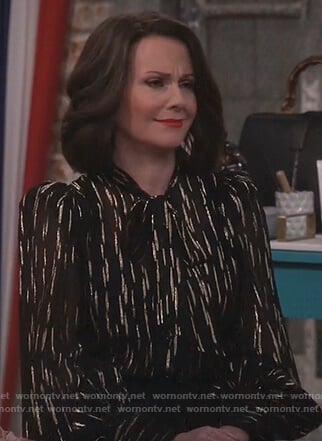 Karen’s black metallic blouse on Will and Grace