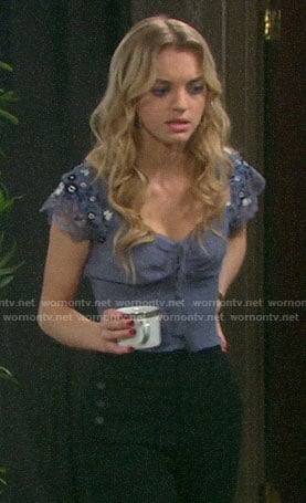 Claire's purple embroidered sleeve top and black jeans on Days of our Lives