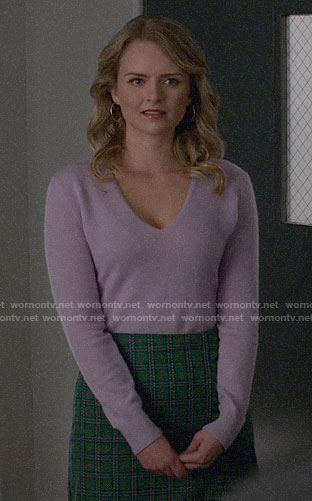 Eve's green checked skirt and lilac sweater on Supergirl