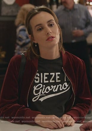 Angie’s red bomber jacket and print tee on Single Parents