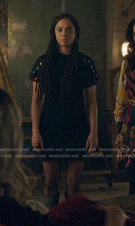 Jada’s black snap sleeve dress and studded boots on Charmed