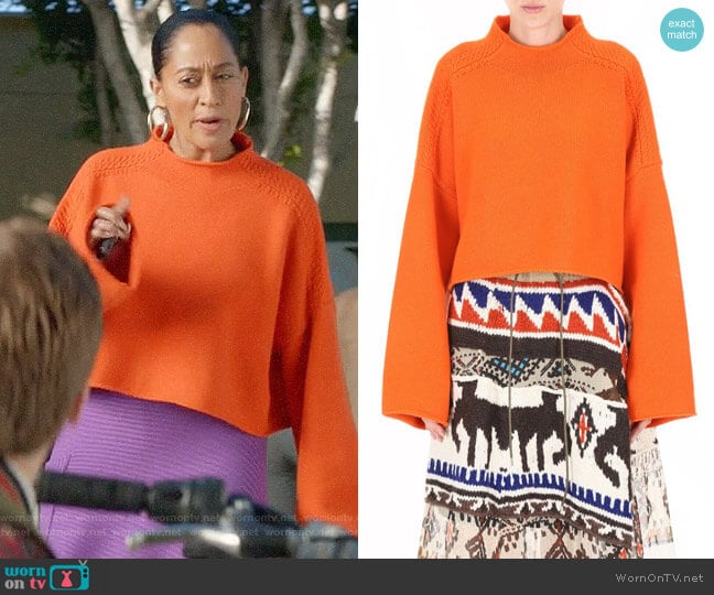 J.W. Anderson Orange Pullover worn by Rainbow Johnson (Tracee Ellis Ross) on Black-ish