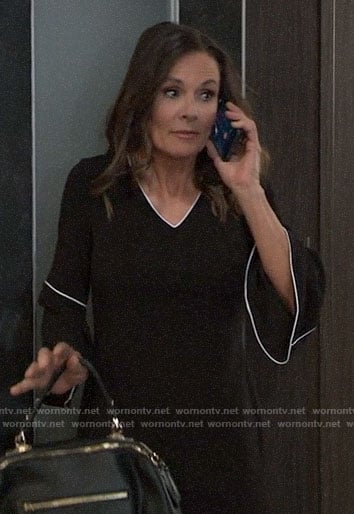 Lucy’s black bell-sleeve dress with white trim on General Hospital