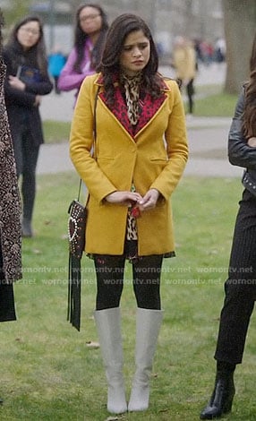 Mel (Maggie)’s yellow coat with red leopard collar on Charmed