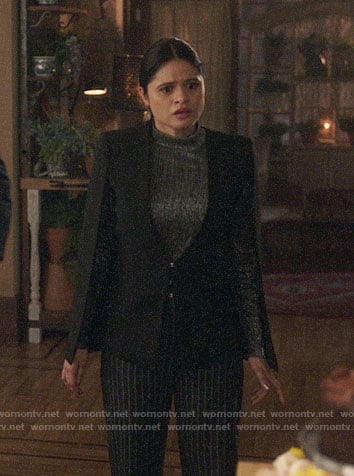 Mel’s black cape jacket on Charmed