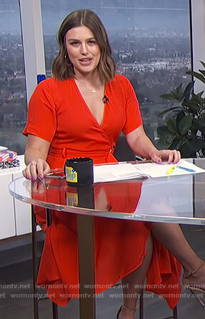 Carissa’s red belted wrap dress on E! News Daily Pop