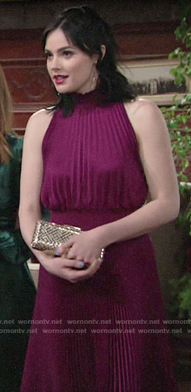 Tessa’s magenta pleated dress at Summer’s wedding on The Young and the Restless