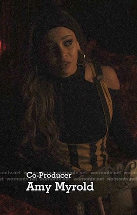 Toni's striped overall dress and black cutout sweater on Riverdale