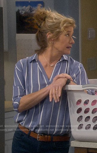 Vanessa's blue striped top and navy wedges on Last Man Standing