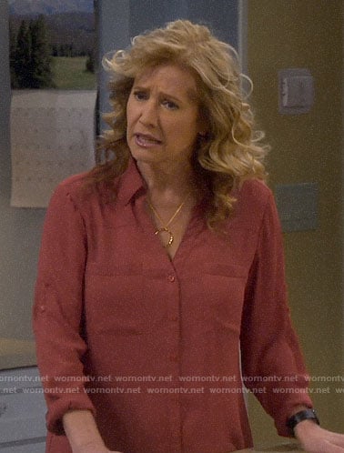 Vanessa's rust button down blouse on Last Man Standing