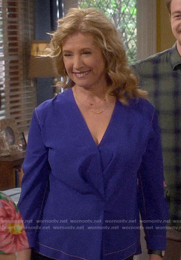 Vanessa's cobalt blue gathered front top on Last Man Standing