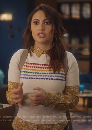 Ana's white heart sweater and yellow floral shirt on Grown-ish