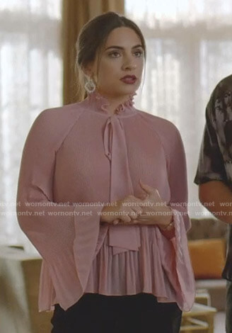 Cristal’s pink pleated tie neck blouse on Dynasty