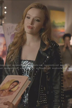 Kirby's sequin jumpsuit and studded moto jacket on Dynasty