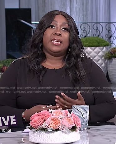 Loni’s black dress with metallic trim on The Real