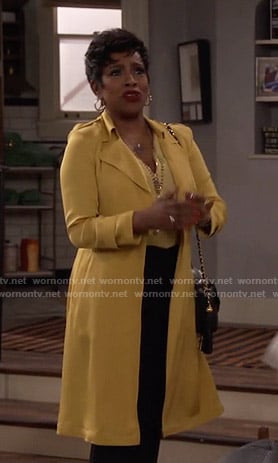 Rose’s yellow wrap trench coat on Fam