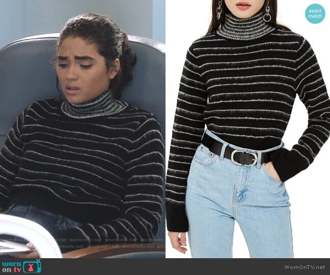 Simone’s black striped turtleneck sweater on Star