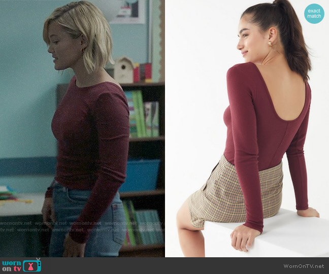 Tandy’s red scoop-back tee on Cloak and Dagger