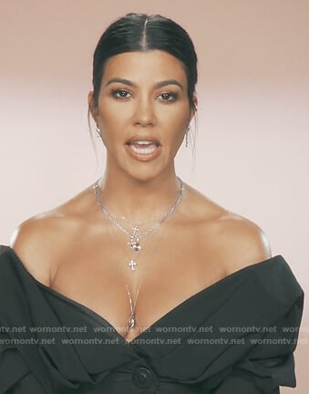 Kourtney's navy off shoulder shirt on Keeping Up with the Kardashians