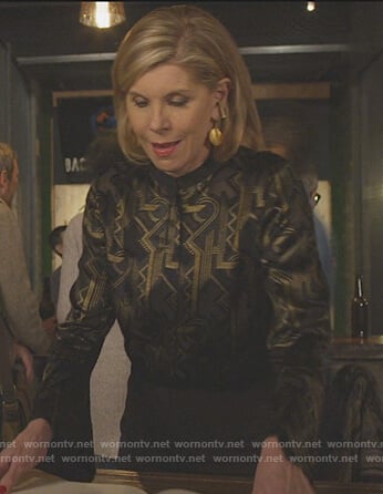 Diane’s black geometric top on The Good Fight