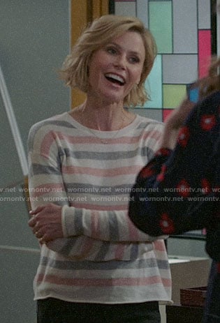 Claire’s pink and grey striped sweater on Modern Family