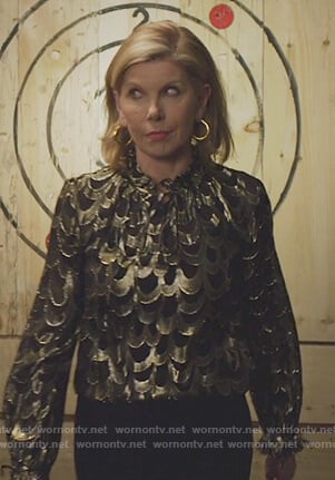 Diane's metallic ruffled top on The Good Fight