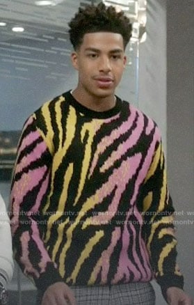 Junior's pink and yellow tiger stripe sweater on Black-ish