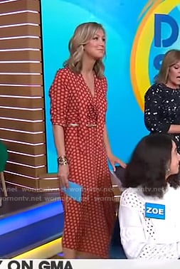 Lara’s orange printed tie neck dress on Good Morning America