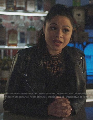 Mel’s star lace top and leather moto jacket on Charmed